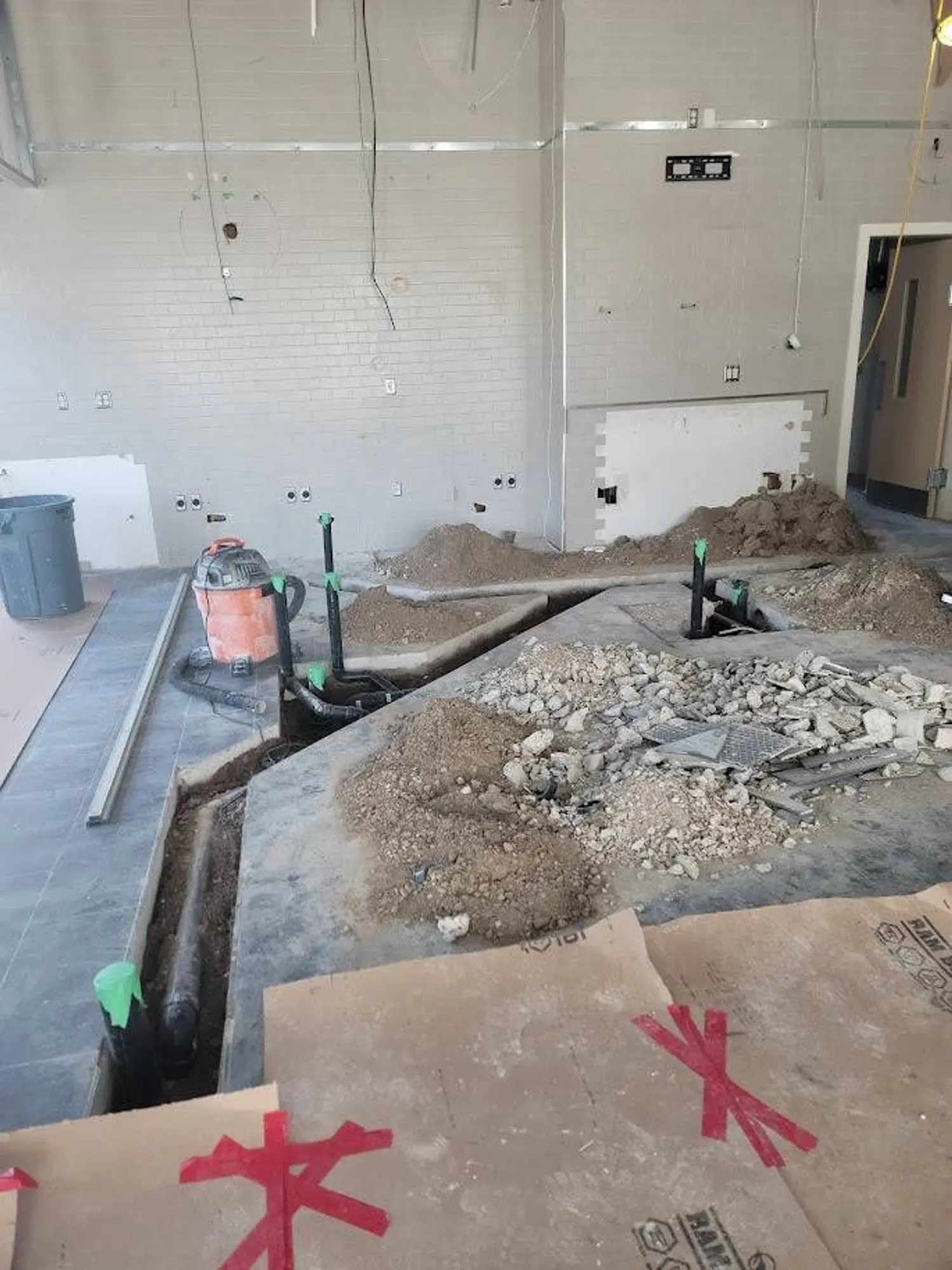 Plumbing trench cut into the slab