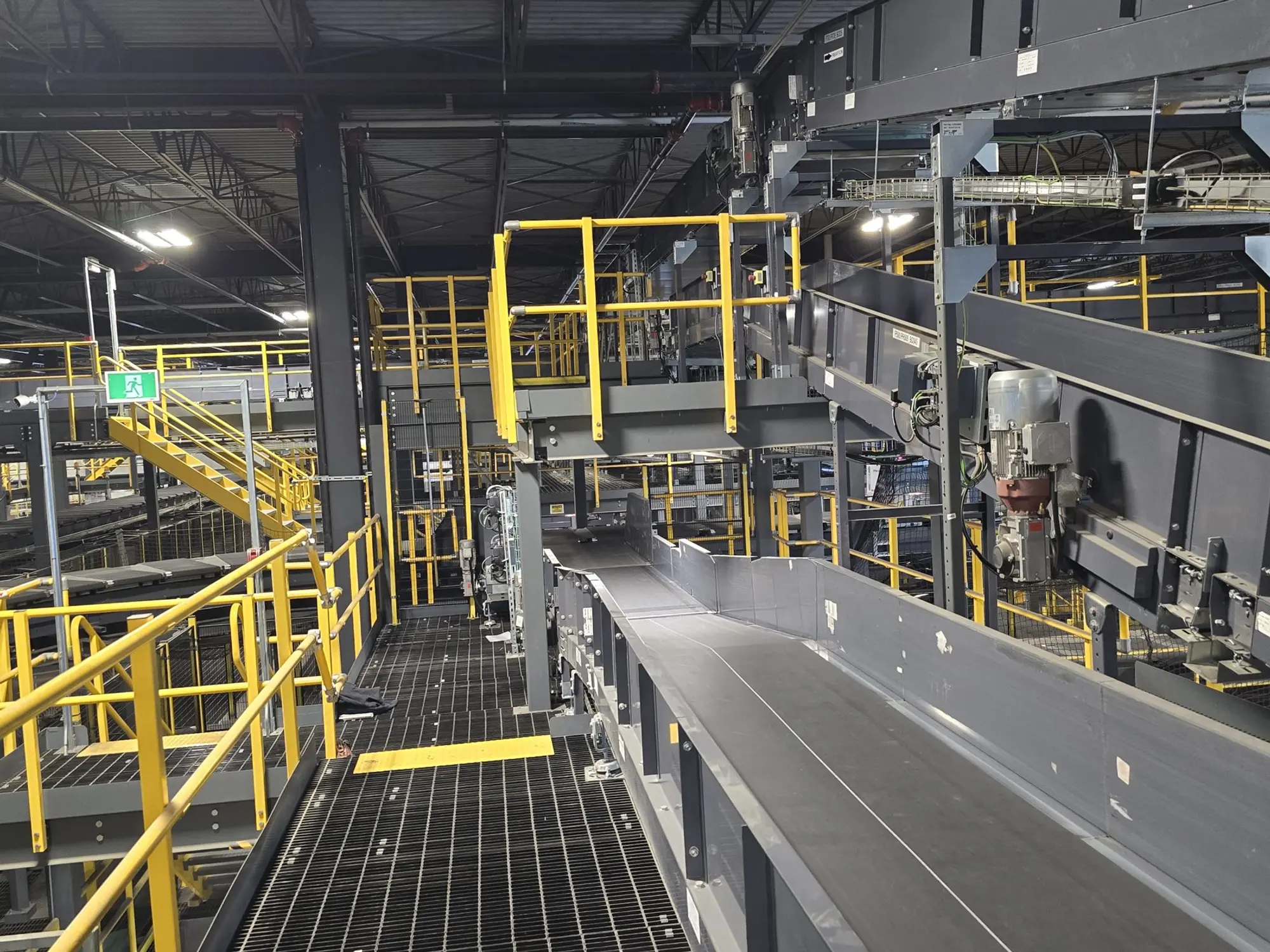 Mezzanine platform with yellow guardrails