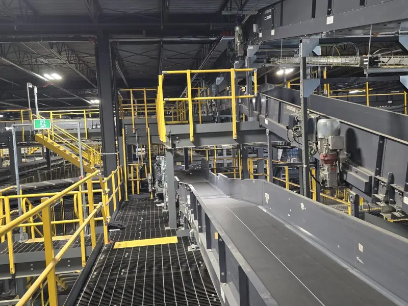 Mezzanine platform with yellow guardrails