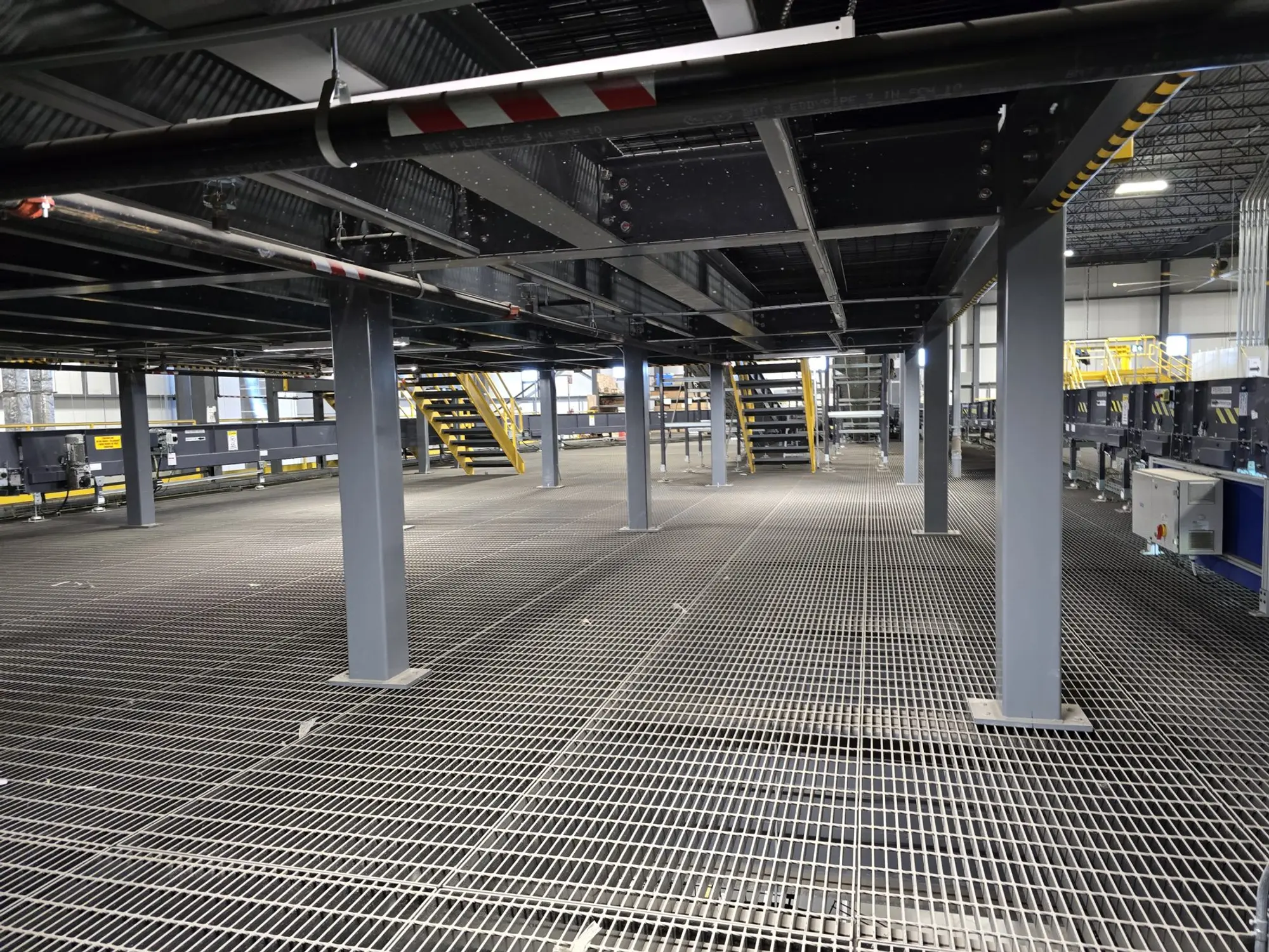 Bar grating platform on HSS columns