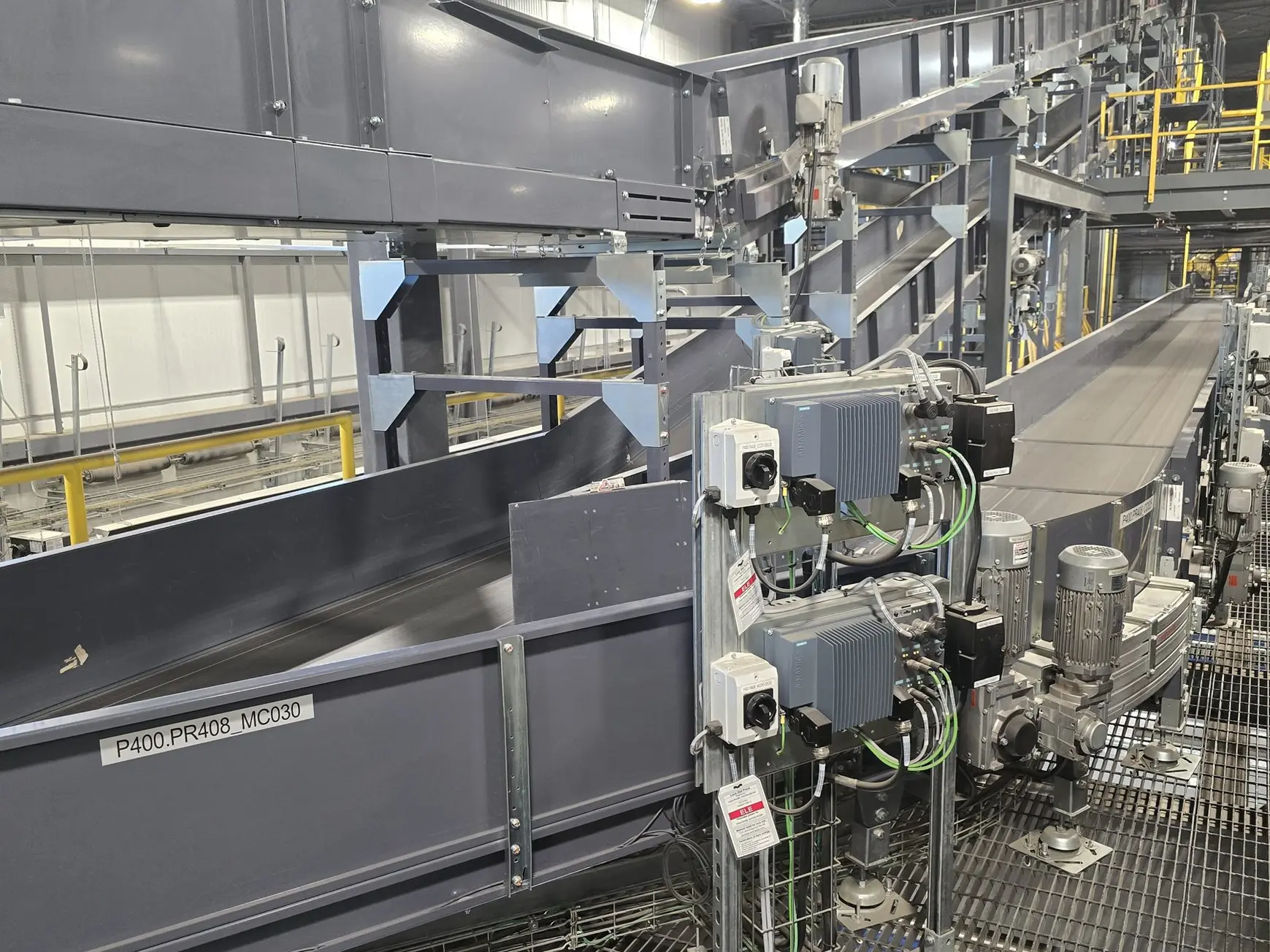 Platform at a conveyor drive
